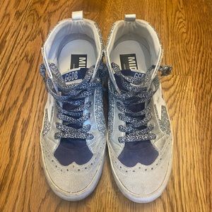 Mid star Golden Goose Sneakers.